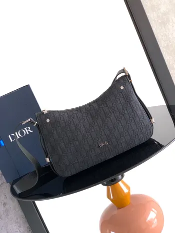 Dior Slider Zipped Pouch, New from the Winter 2025 Men s Collection Replica Dior mens bags