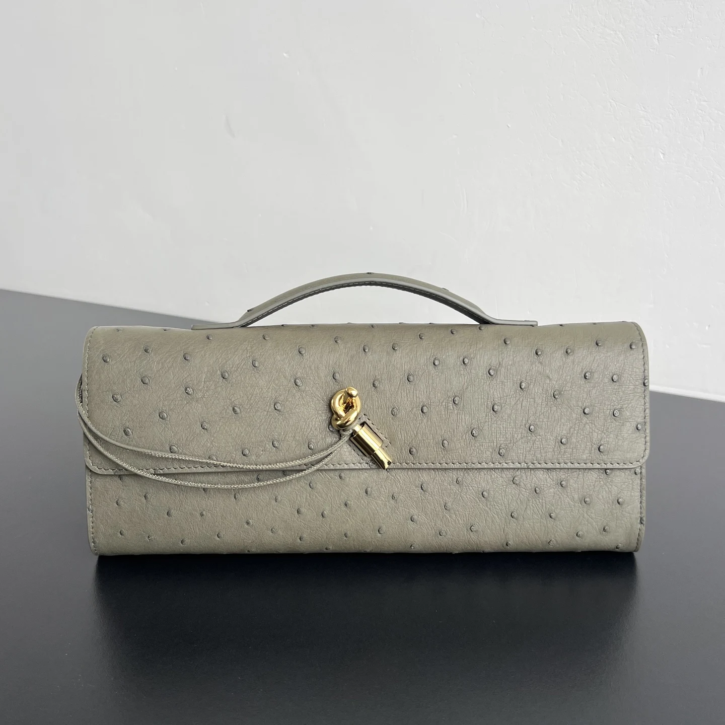 Bottega Veneta New Andiamo clutch in ostrich leather Bottega Veneta New Andiamo clutch in ostrich leather