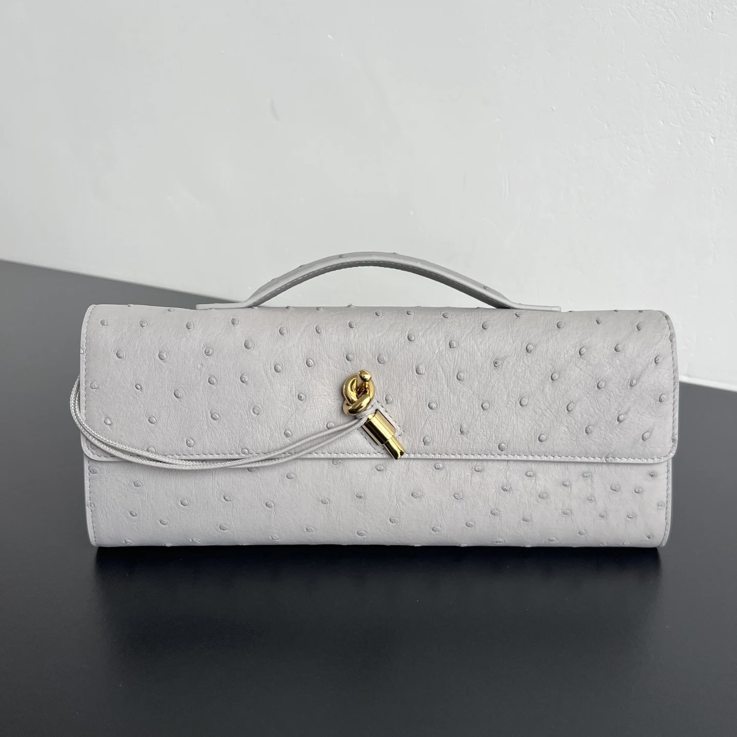 Bottega Veneta New Andiamo clutch in ostrich leather Bottega Veneta New Andiamo clutch in ostrich leather