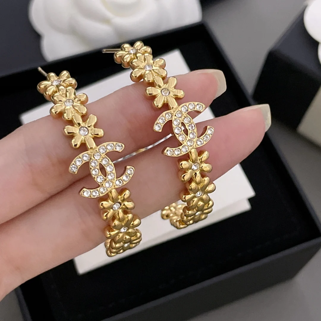 Chanel Small gold flower ear hoops