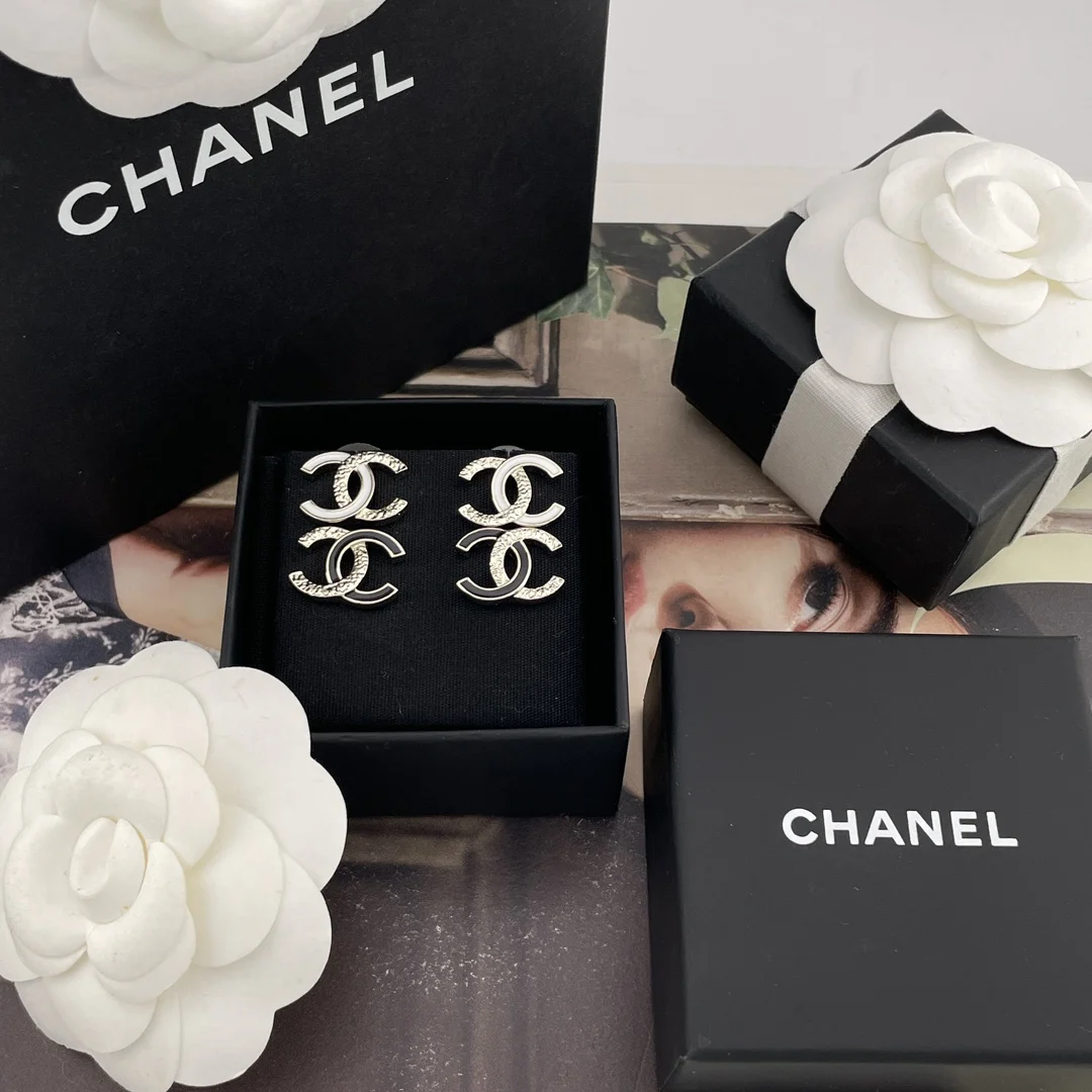 Chanel Scented Lava Black and White C-shaped Earrings