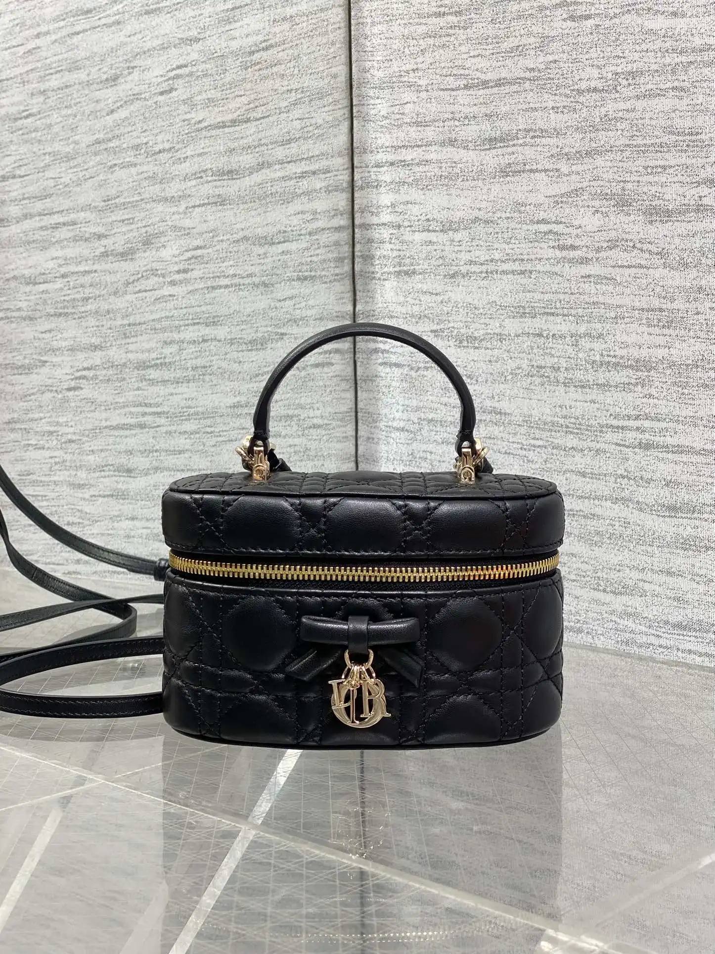 迪奥 蝴蝶结化妆包 女士斜挎包