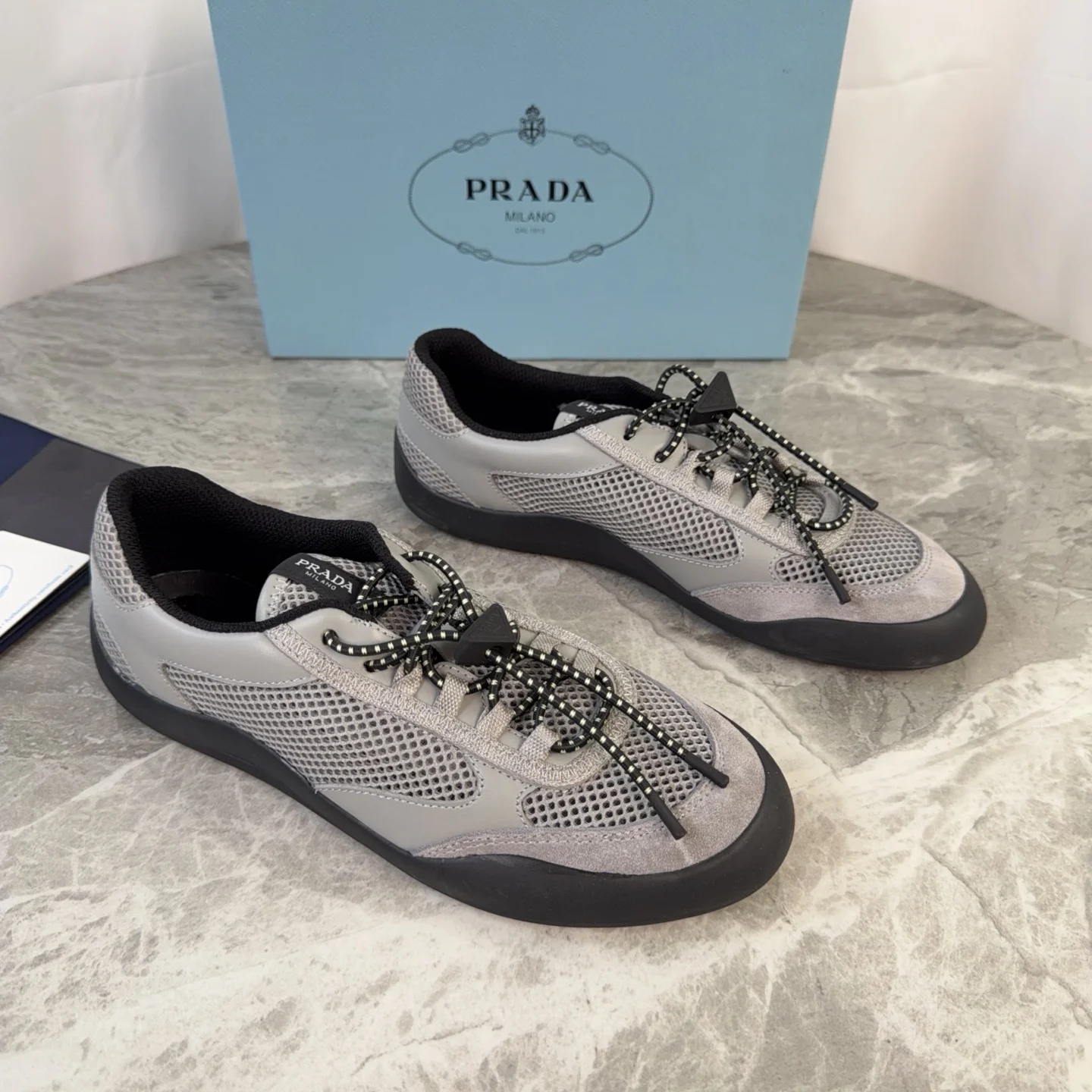 Prada Non-slip patterned outsole couple casual shoes