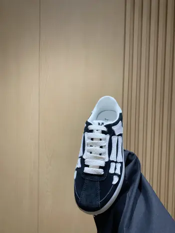 Classic Bone Pattern Suede Sneakers Women s Couple Casual Shoes Replica AMIRI Womens Casual and Sneakers