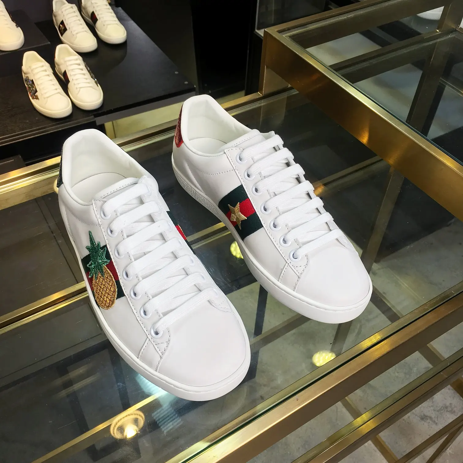 Gucci Couple s embroidered canvas white sneakers