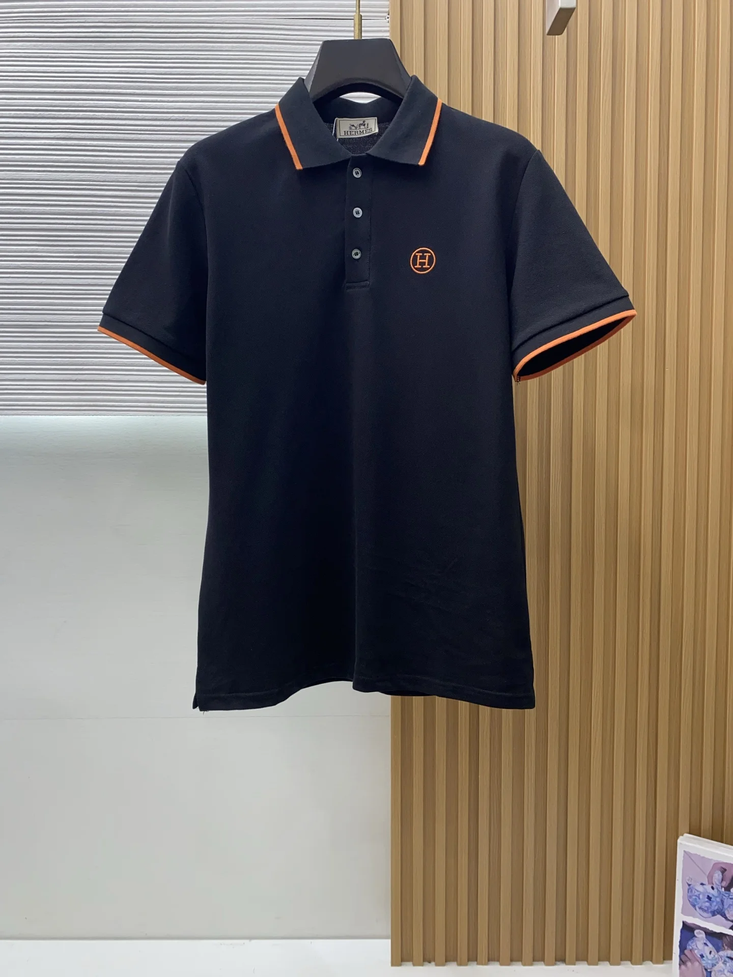 Hermes Polo shirt with short sleeves and a notch collar.