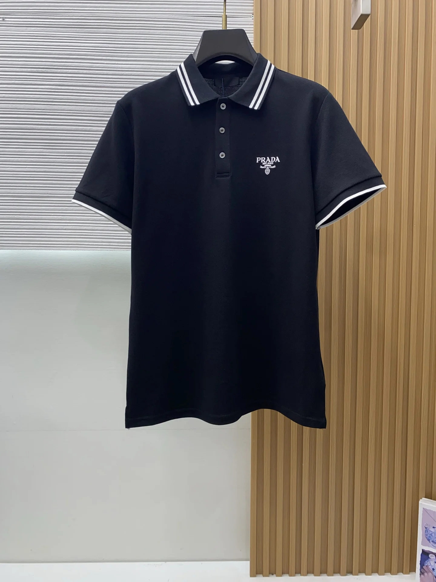 Prada Polo shirt with short sleeves and a notch collar.