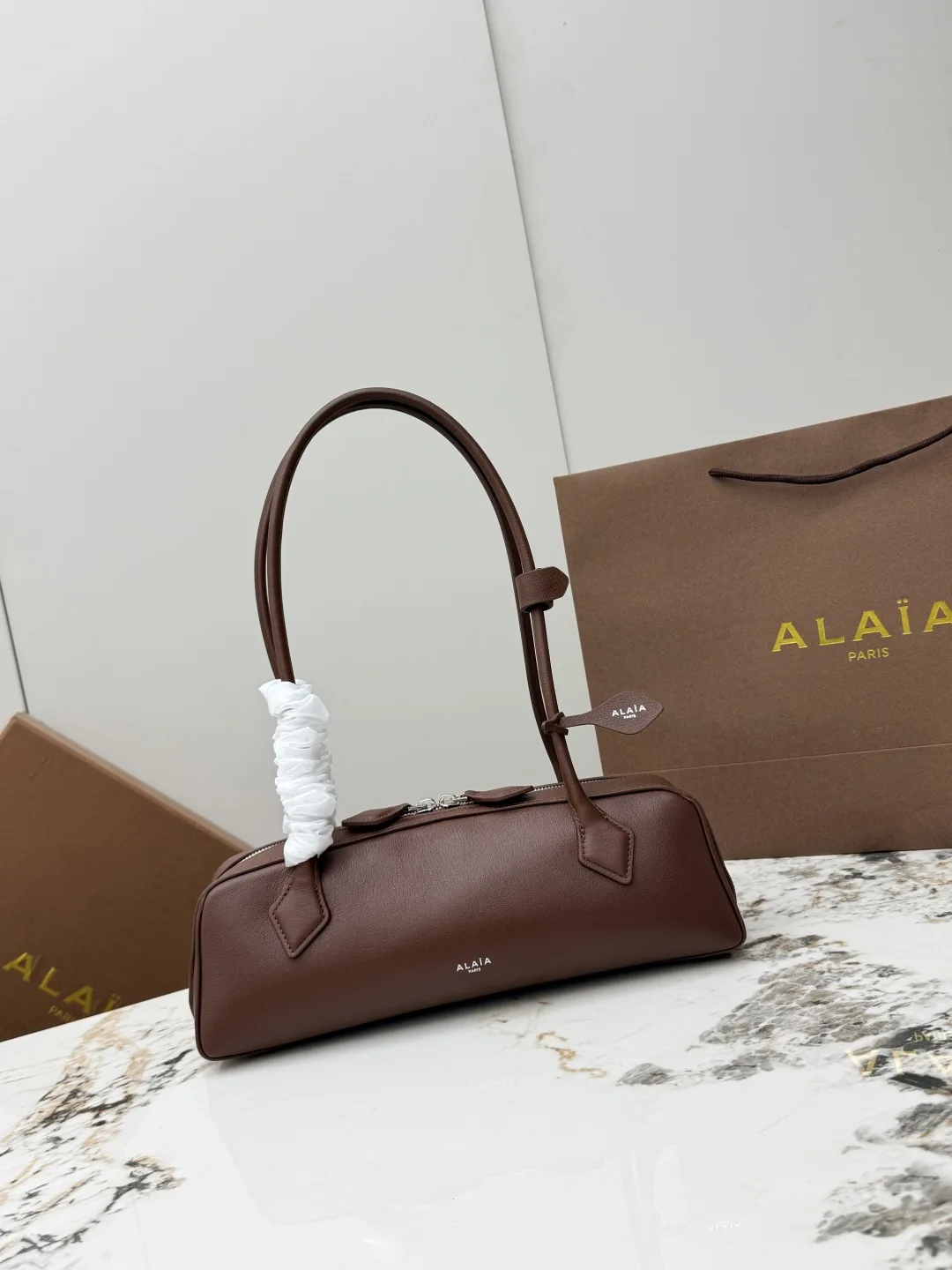 ALAIA A06033 Goat Leather Sausage Bag Women s Shoulder Bag