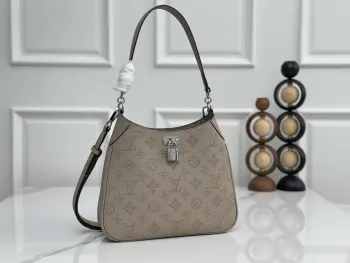 M28306 Cut-out Leather Small Handbag Women s Crossbody Bag Replica Louis Vuitton womens bags