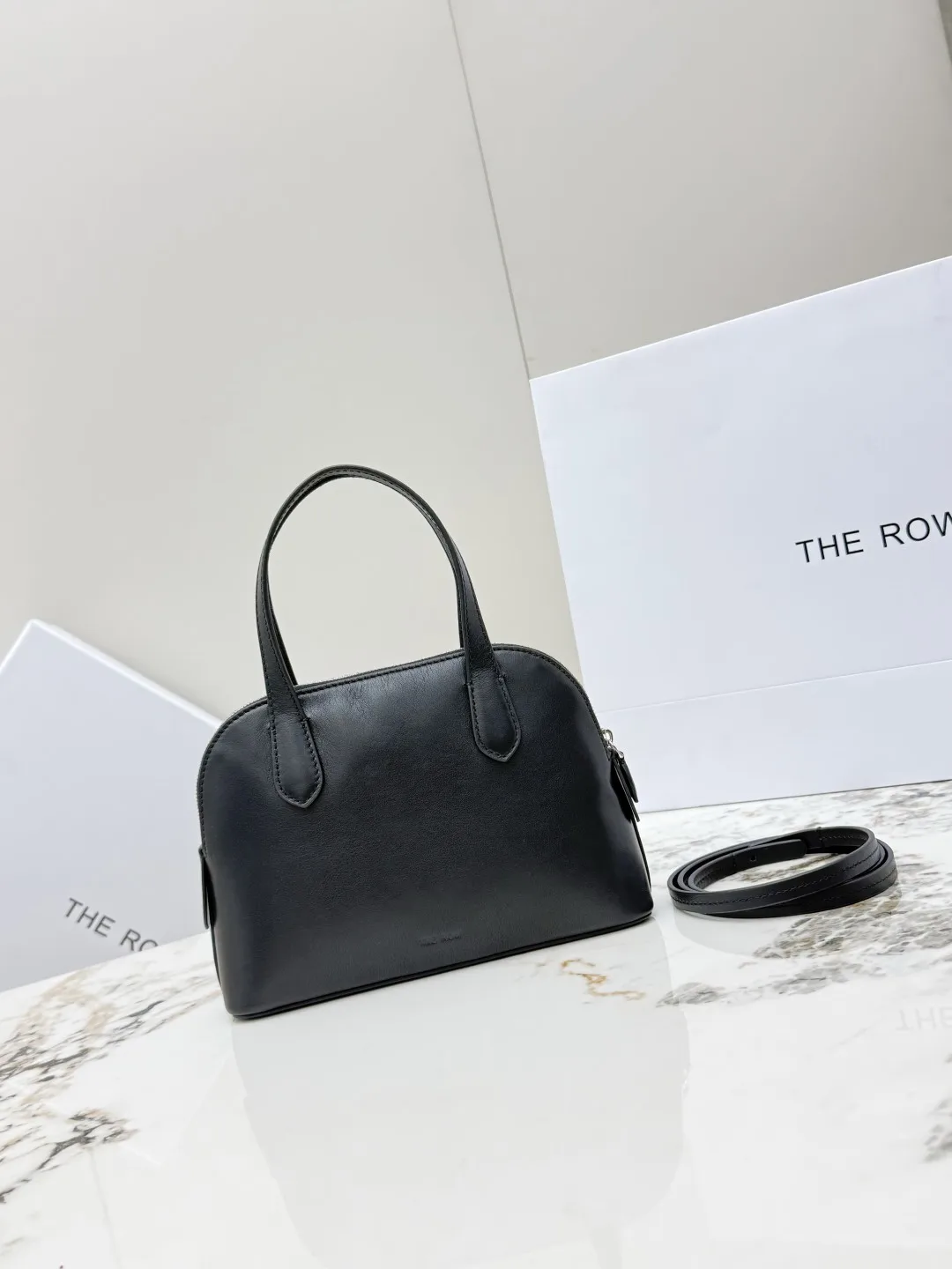 THE ROW T1714 Plain Weave Saddle Small Calfskin Shell Bag Women s Crossbody Bag THE ROW T1714 Plain Weave Saddle Small Calfskin Shell Bag Women s Crossbody Bag