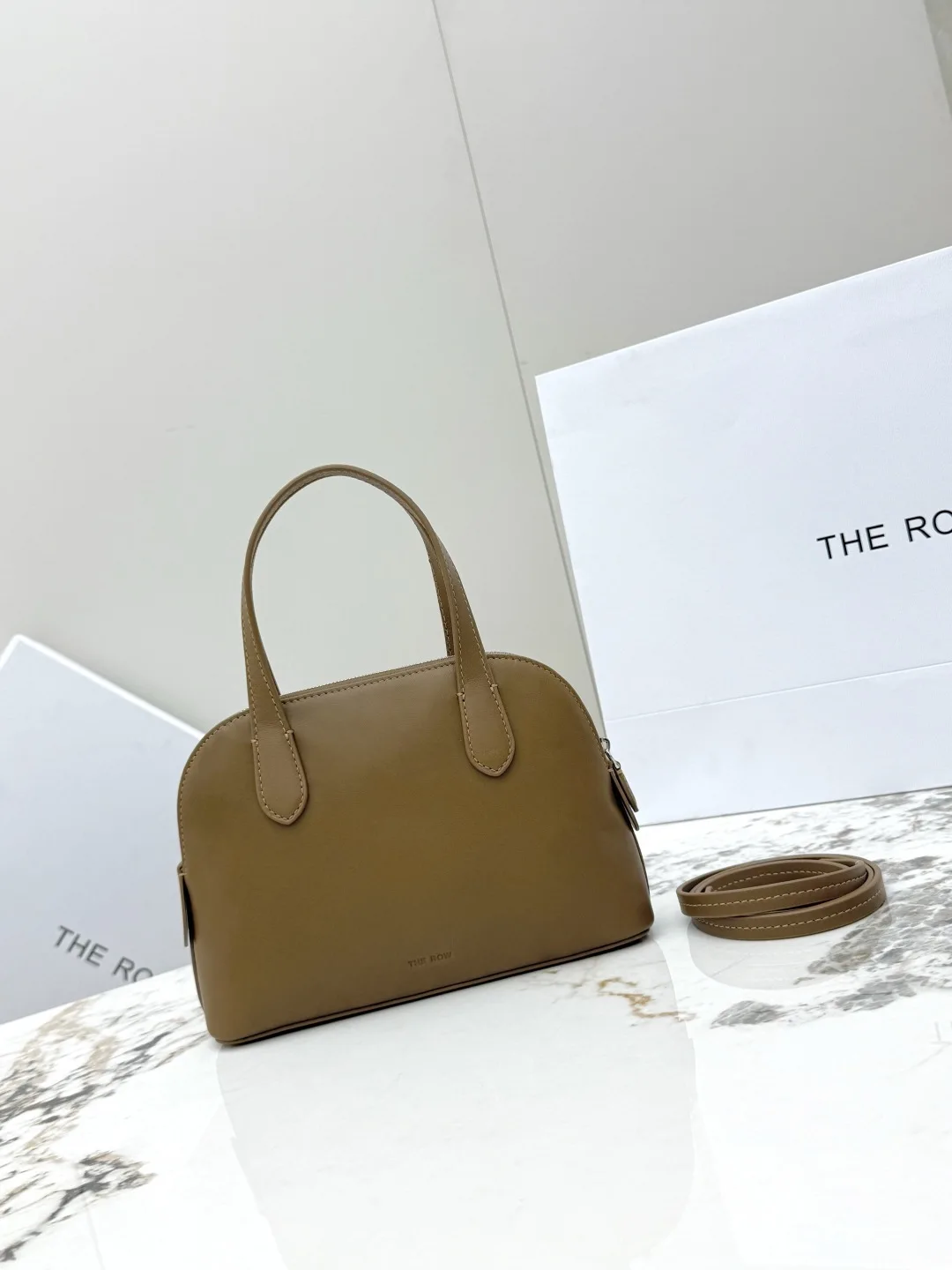 THE ROW T1714 Plain Saddle Small Calfskin Shell Bag Women s Crossbody Bag THE ROW T1714 Plain Saddle Small Calfskin Shell Bag Women s Crossbody Bag