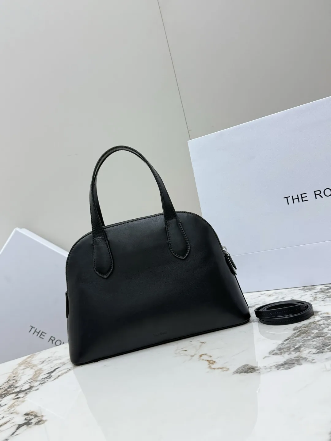 THE ROW T1908 Plain Weave Saddle Calfskin Shell Bag Women s Crossbody Bag THE ROW T1908 Plain Weave Saddle Calfskin Shell Bag Women s Crossbody Bag