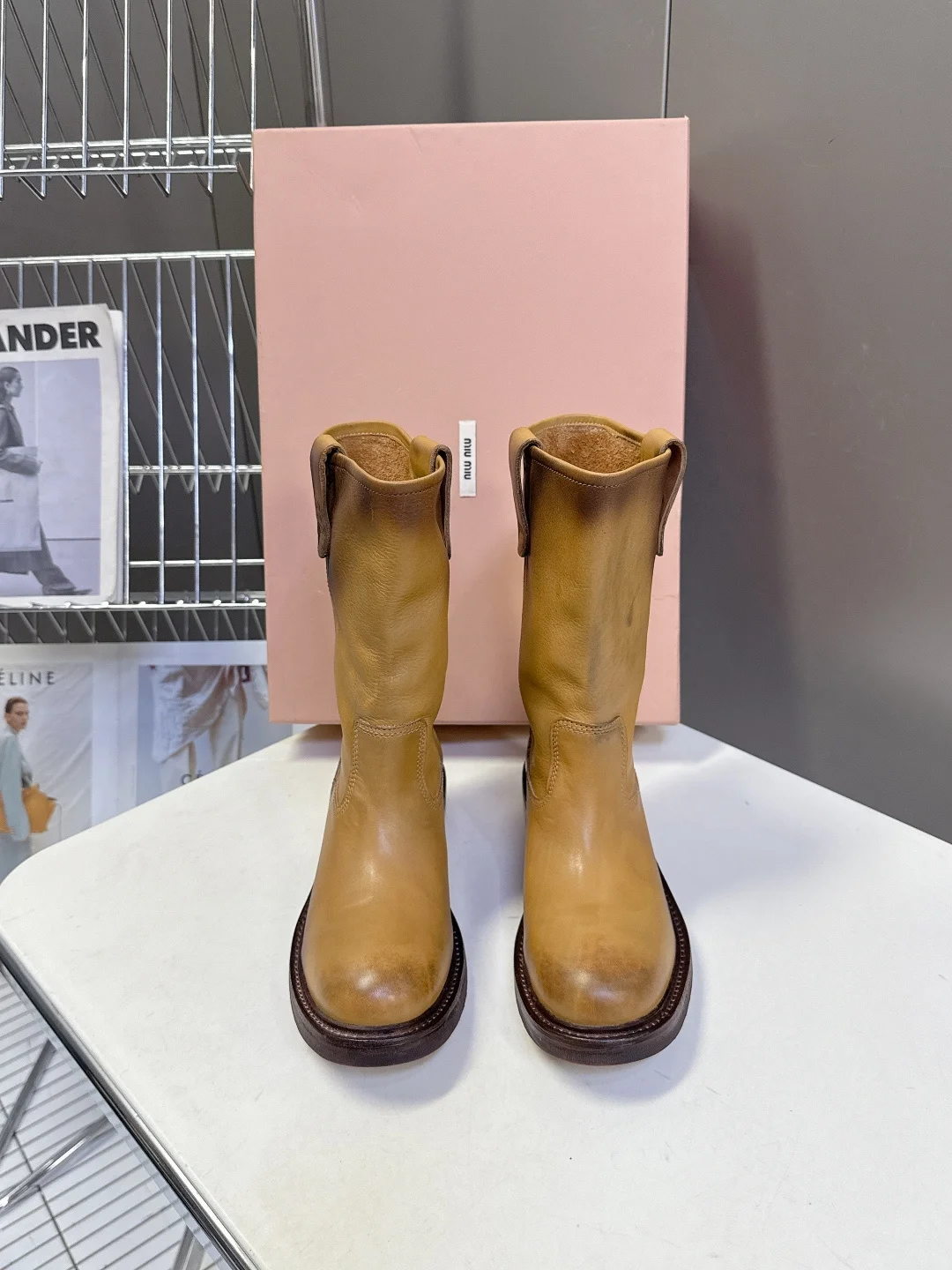 MIU MIU Latest vintage-style distressed mid-calf boots for women MIU MIU Latest vintage-style distressed mid-calf boots for women